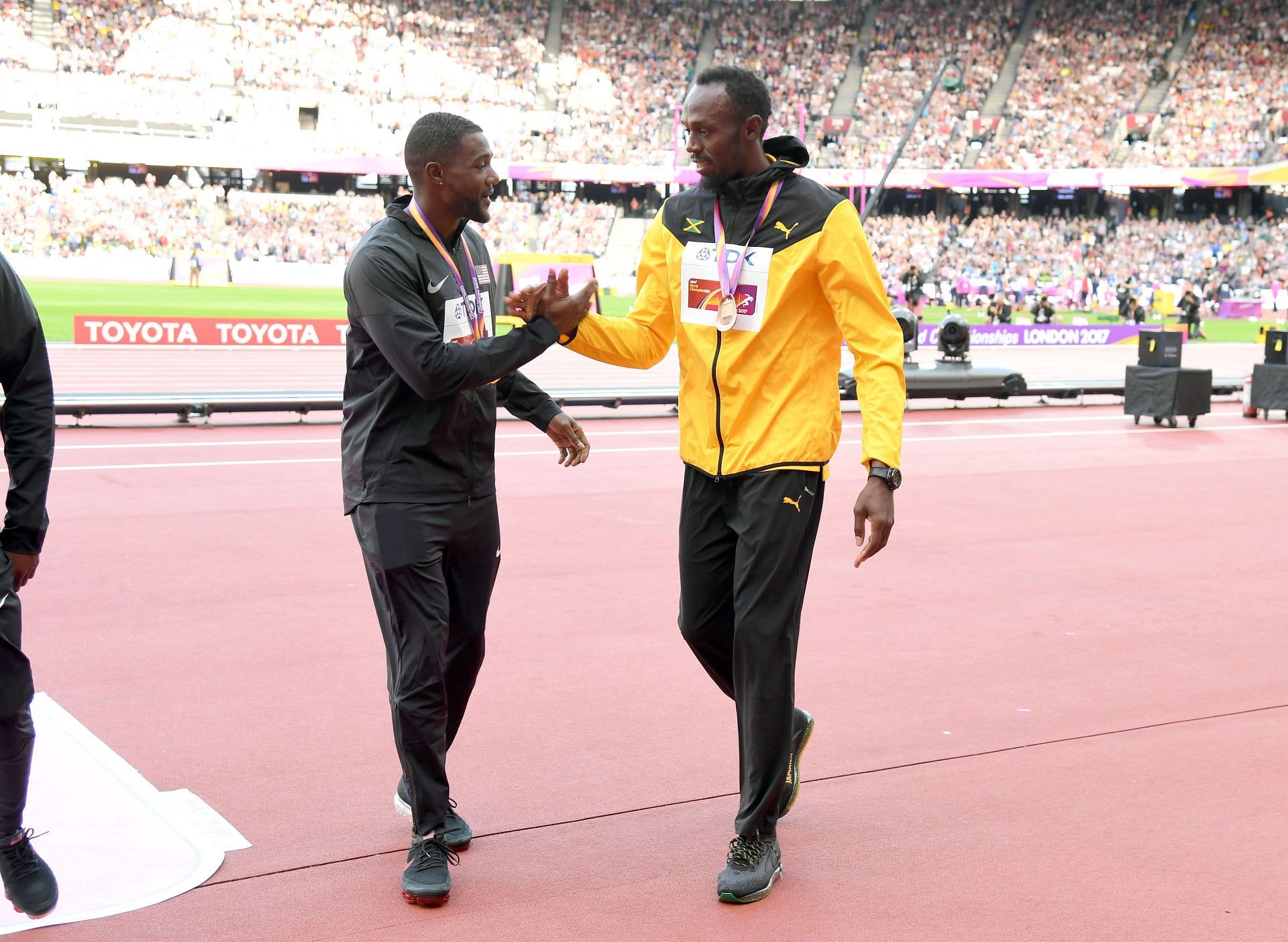 Justin Gatlin and Bolt at the VIP's Attend The IAAF World Athletics Championships - (Source: Getty)